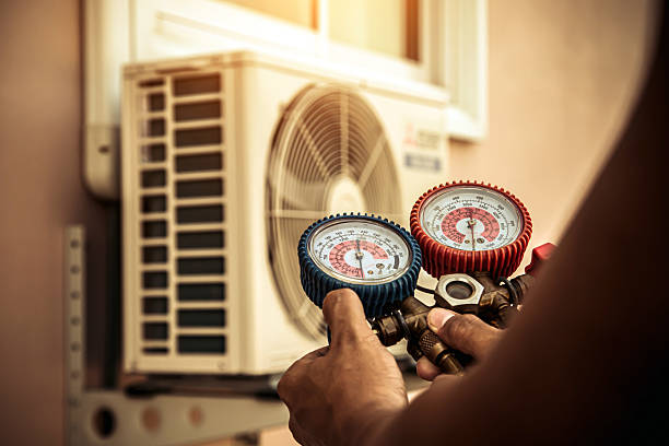 Professional Hvac technician working in Smithville, NJ